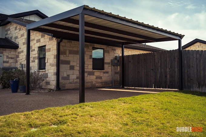 Single metal carport with red steel frame in Waco, TX