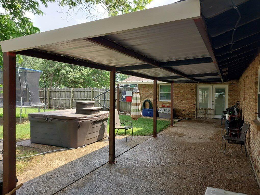 Steel patio cover attached to residential home in Waco
