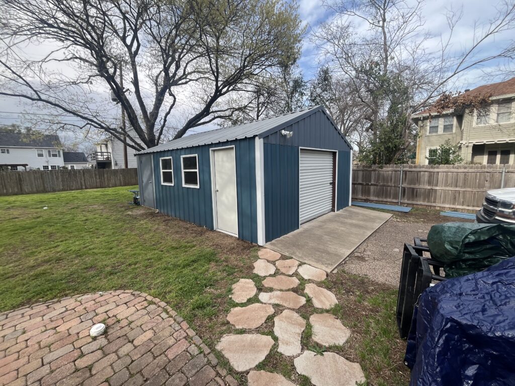 custom 24x24 metal workshop with roll up door and man door waco tx