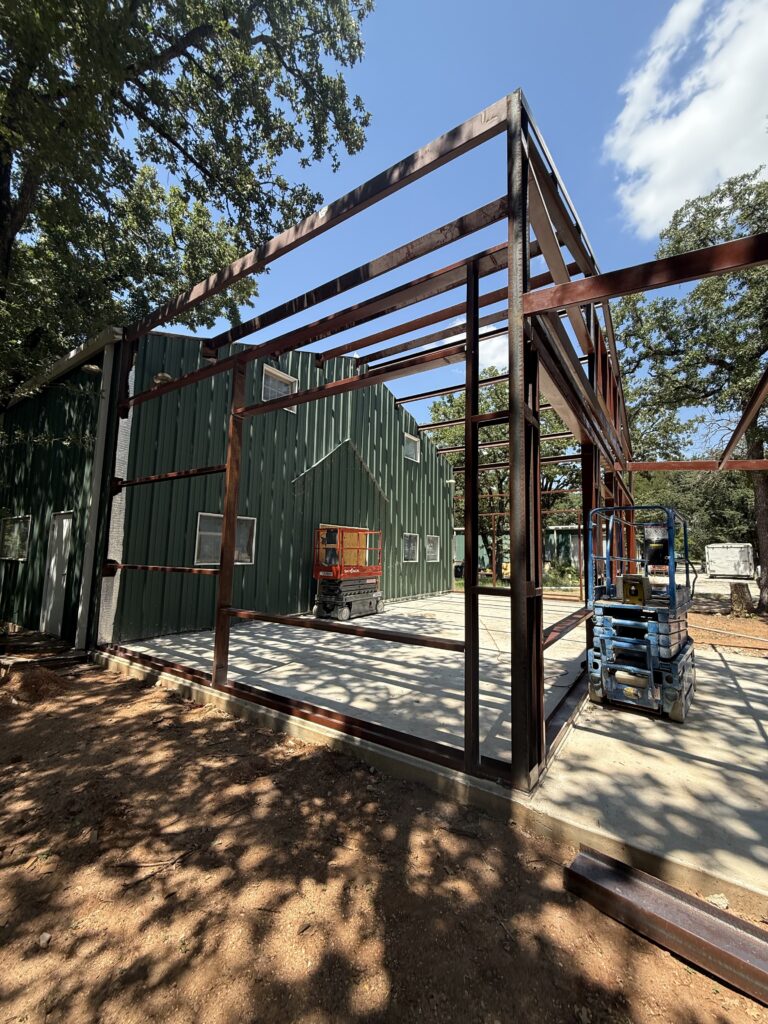 30x40 metal building custom with metal cover. Concrete dirt work red steel waco tx